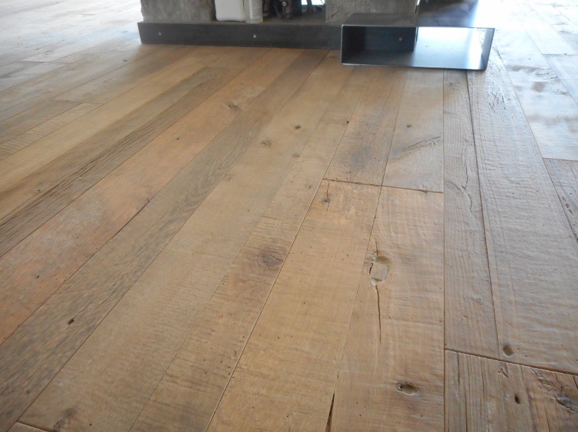 Reclaimed wood plank flooring
