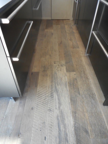 Reclaimed wood plank flooring