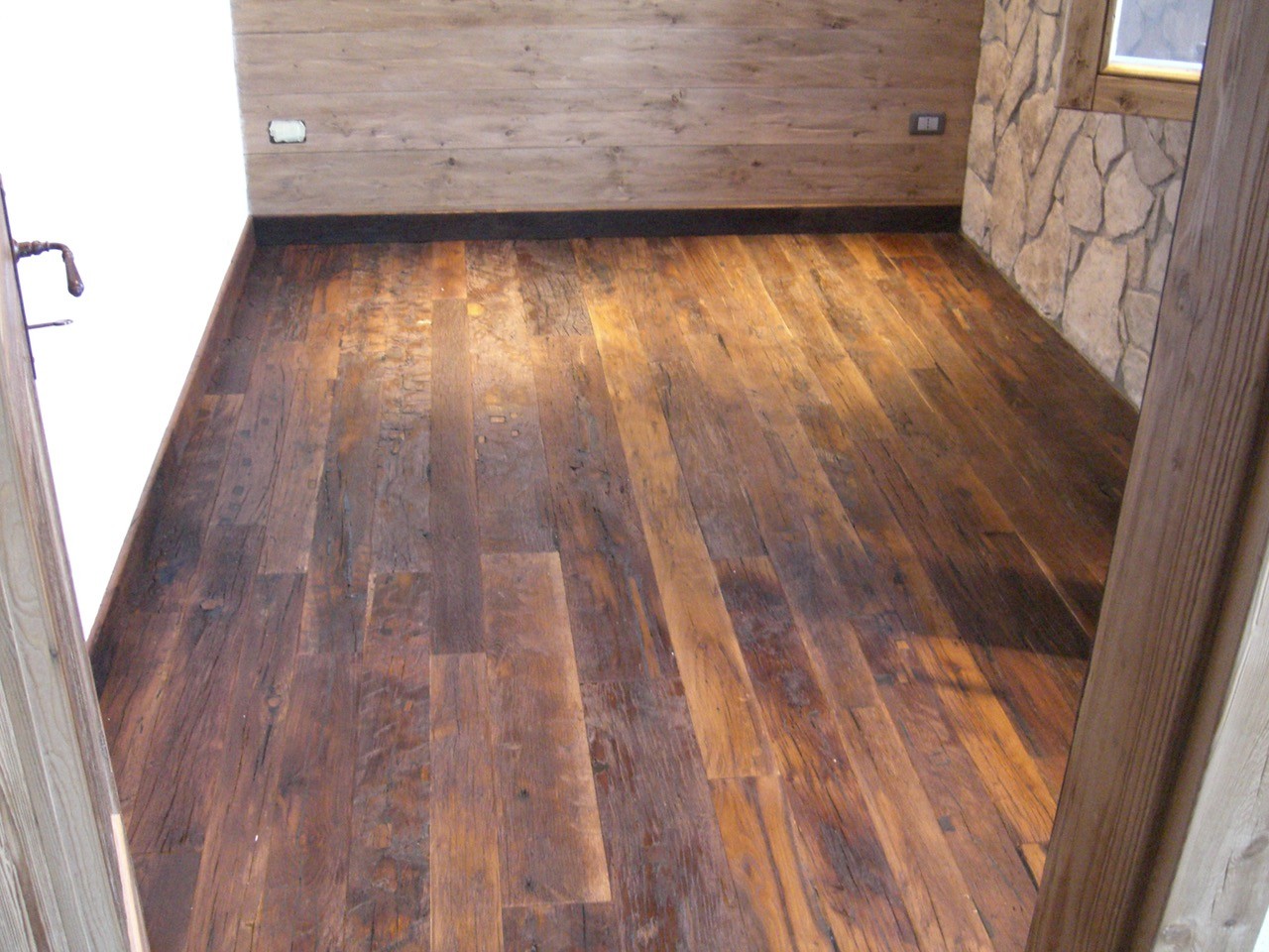 Reclaimed wood plank flooring