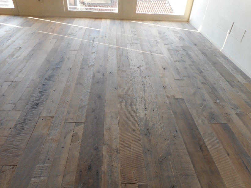 Reclaimed wood plank flooring