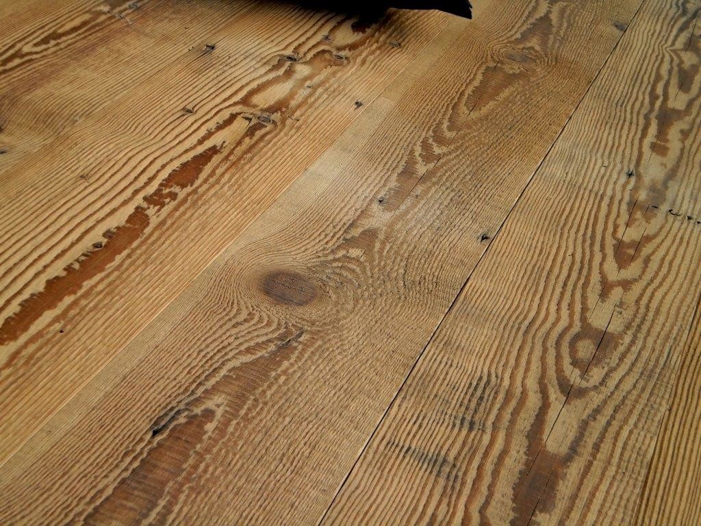 Reclaimed wood plank flooring